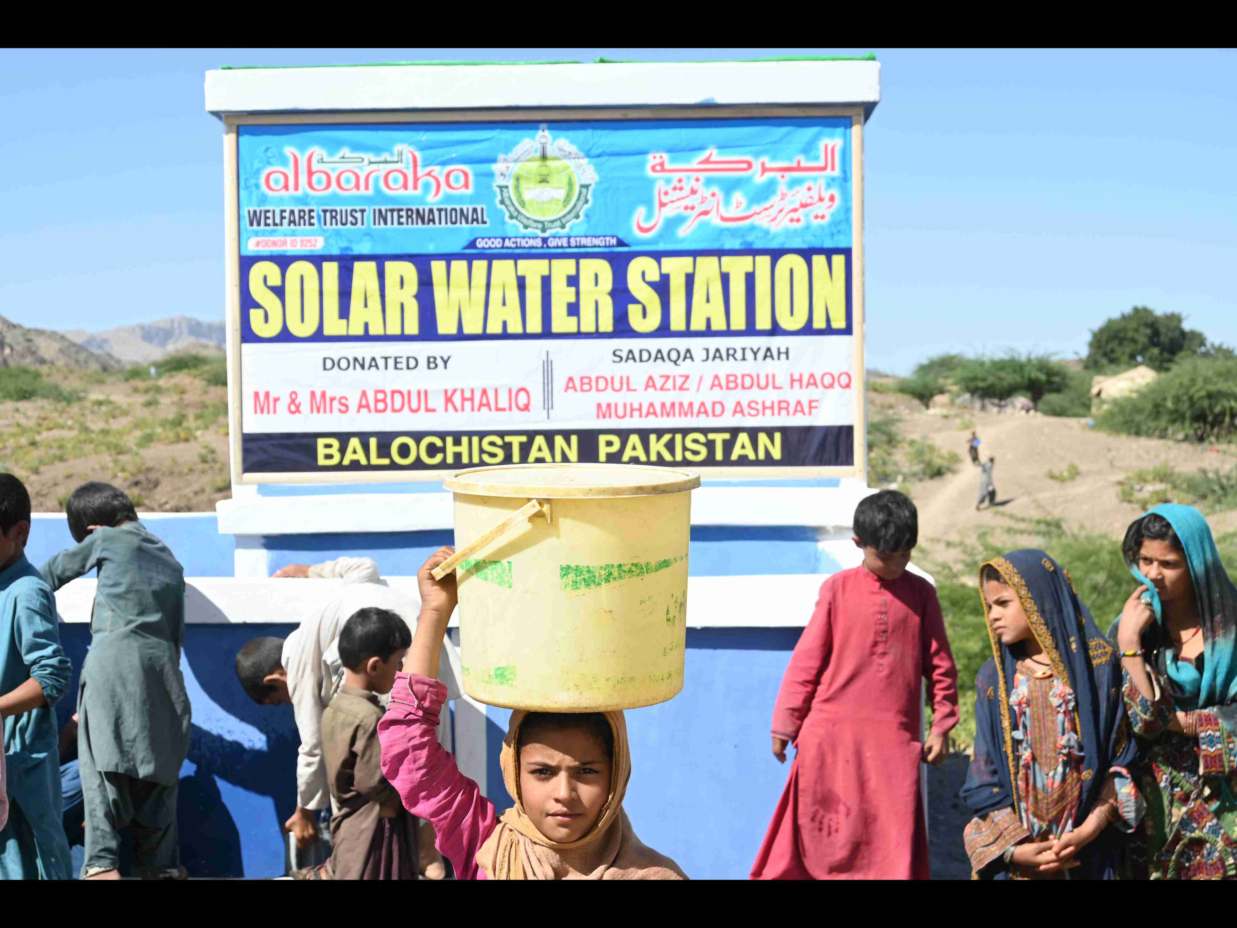 Smiling child with food bag
